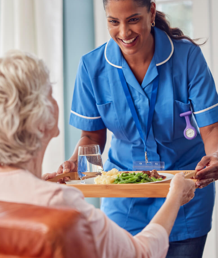 nurse giving food